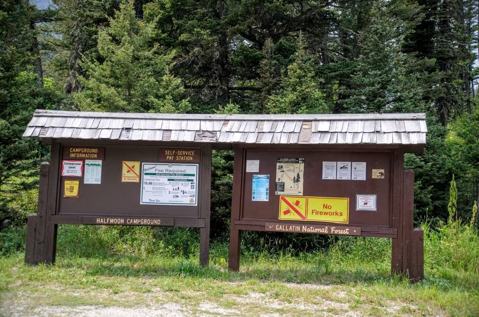 Halfmoon Campground information kiosks with self-service pay station and forest regulations