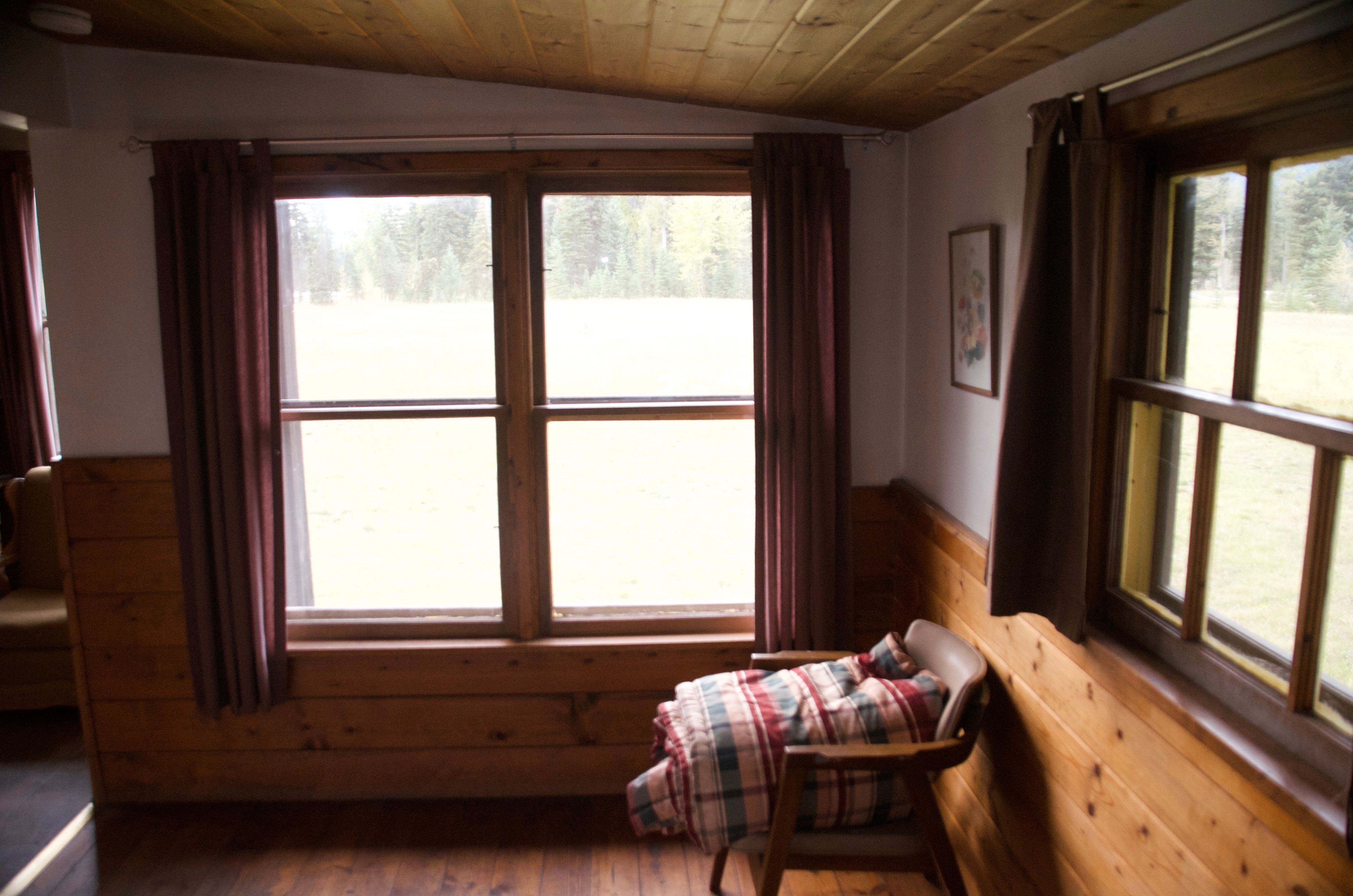 Ben Rover Cabin bedroom with metal frame bed