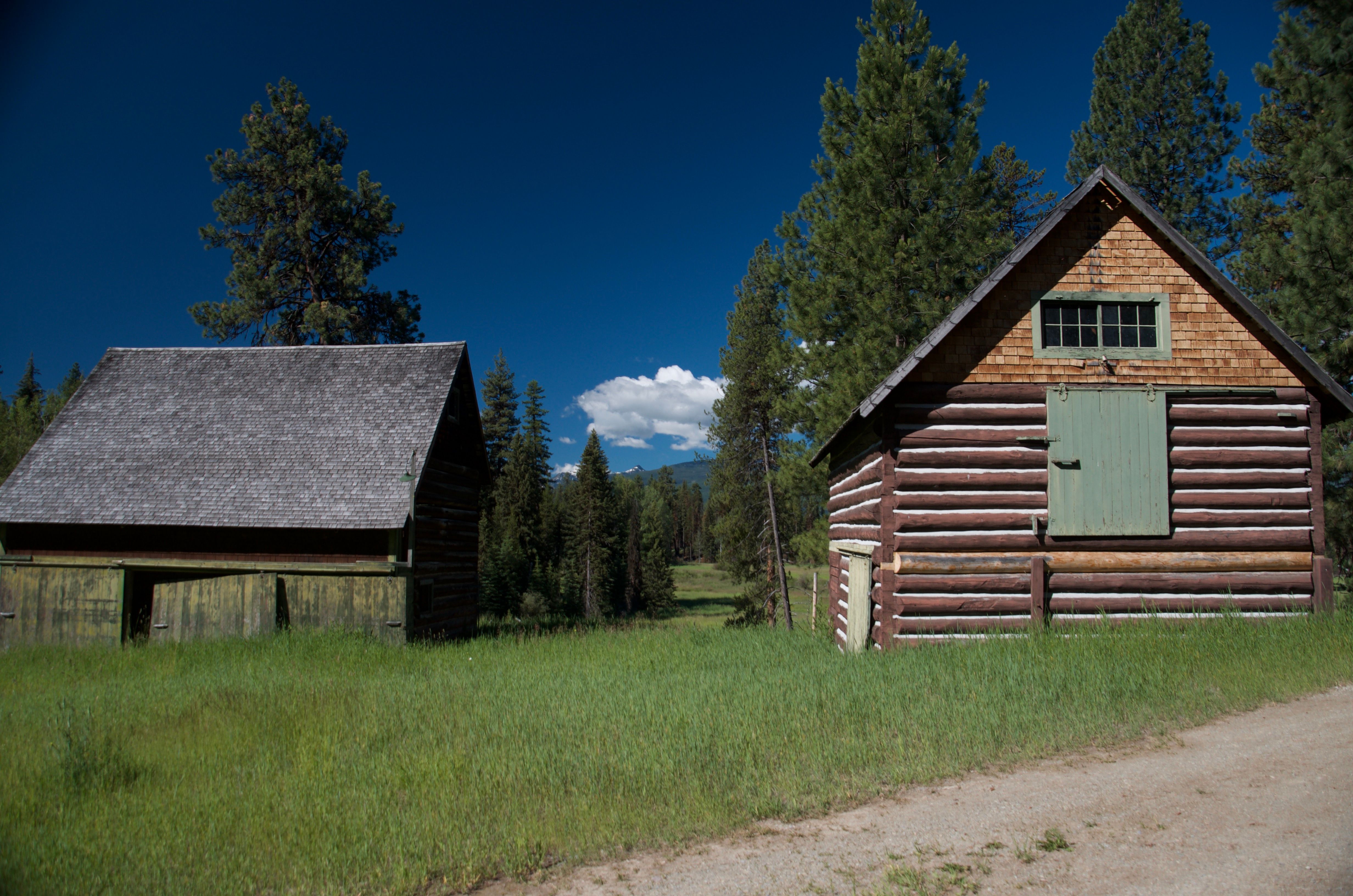 Close view of the original barn and storage shed buildings at the Old Condon Ranger Station compound