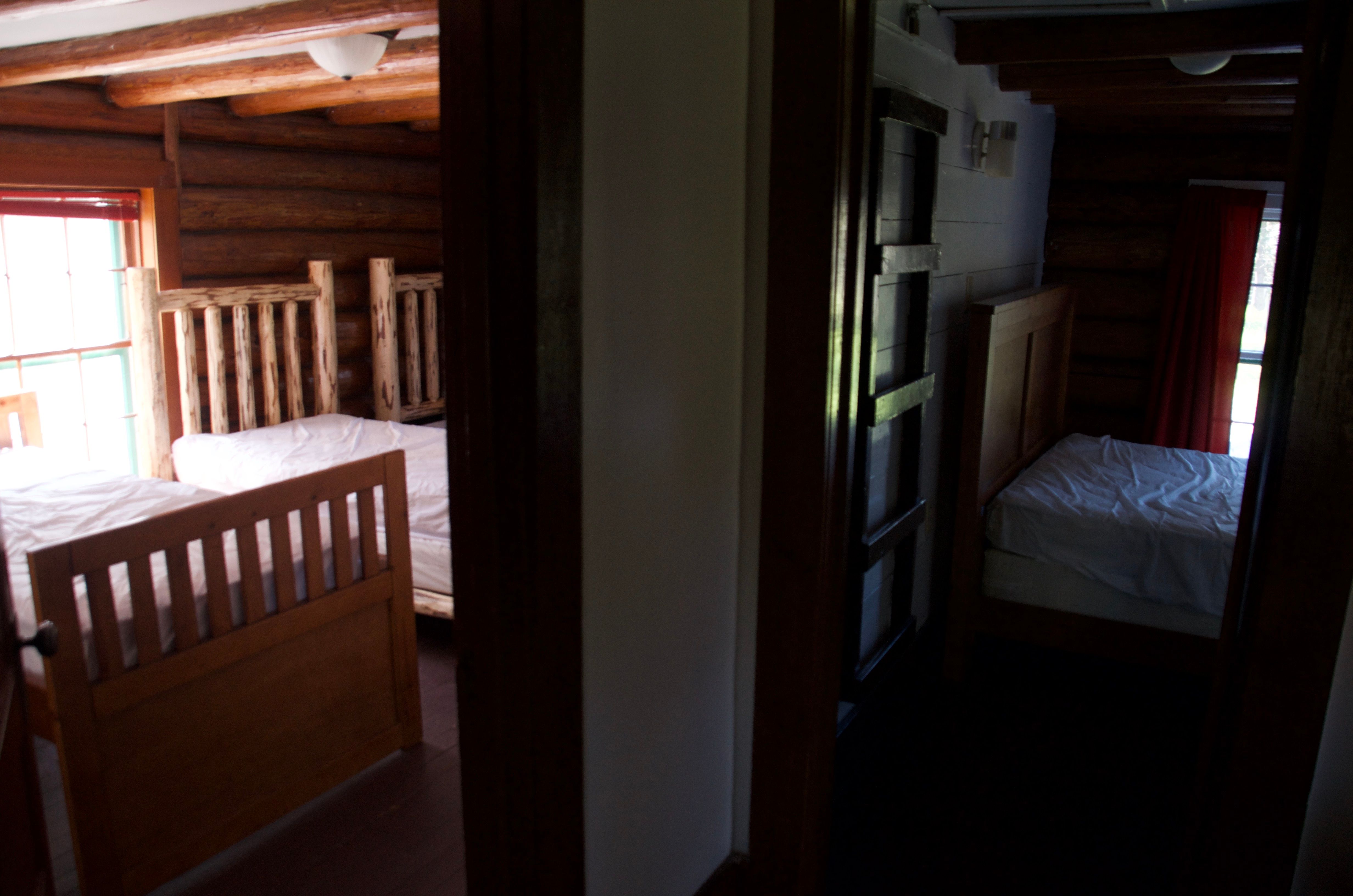 Upstairs hallway showing two bedroom doorways in the Old Condon Ranger Station