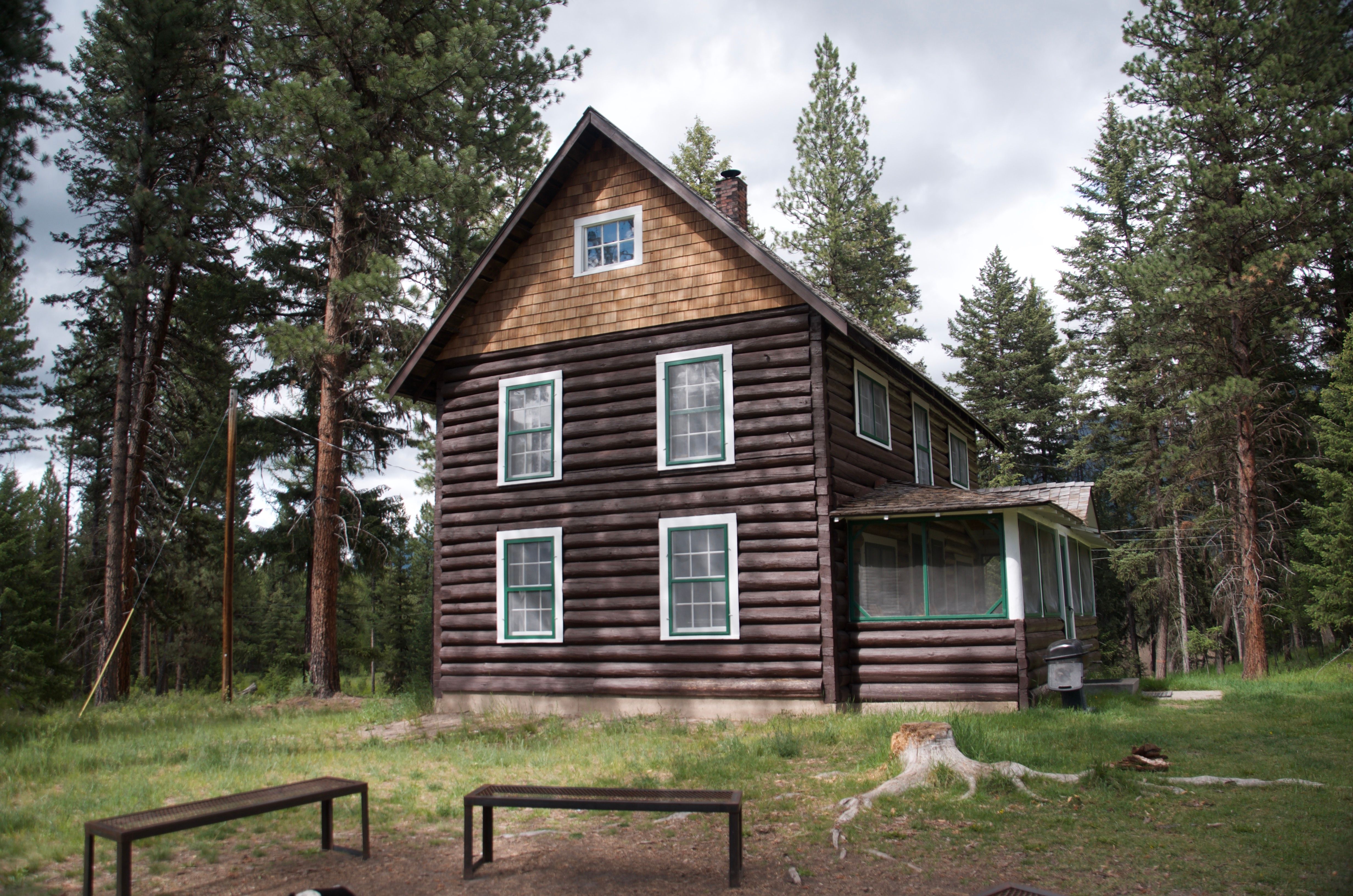 Rear side view of the Old Condon Ranger Station showing the screened porch