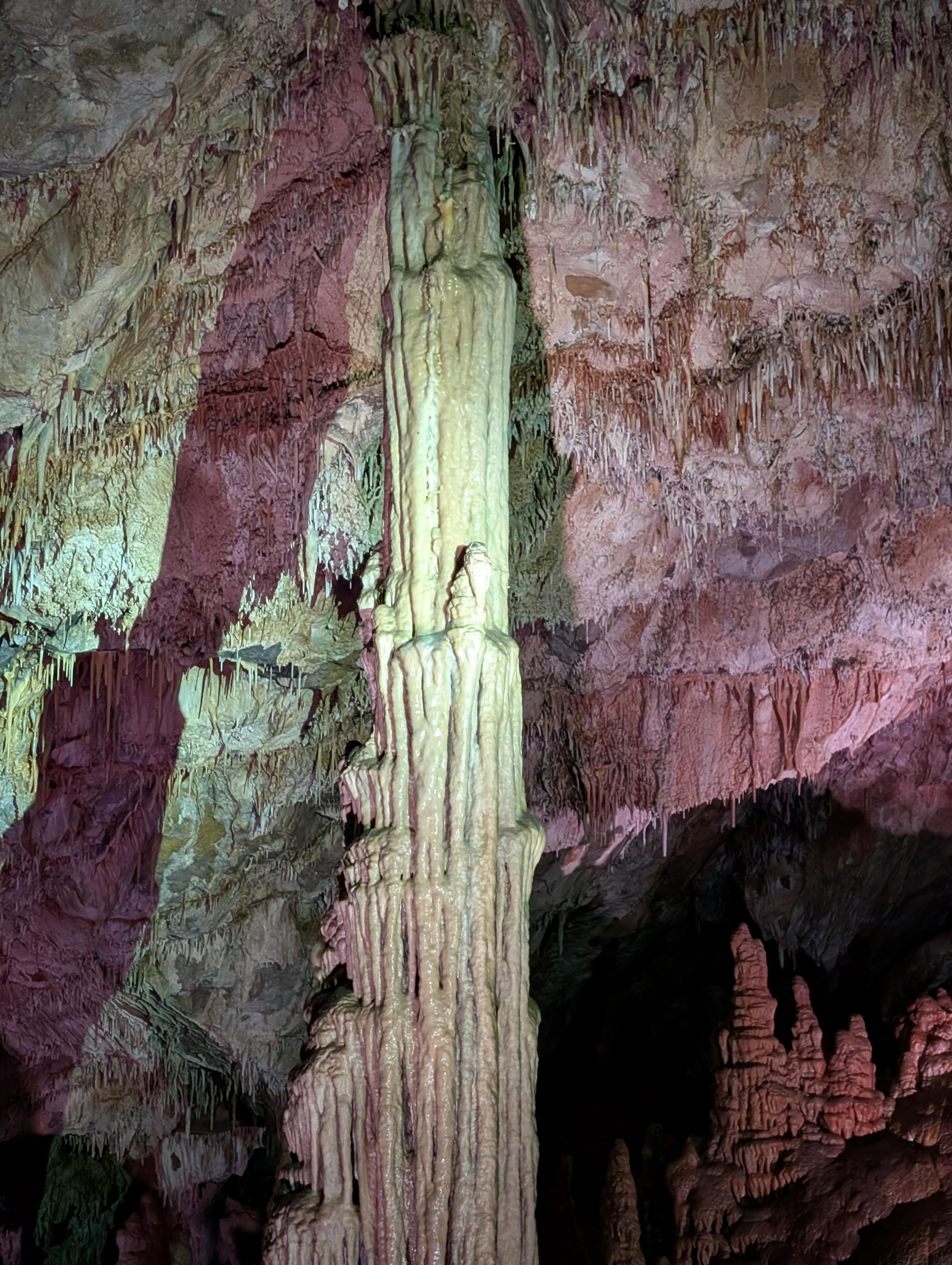 Tall cave column with colorful lighting