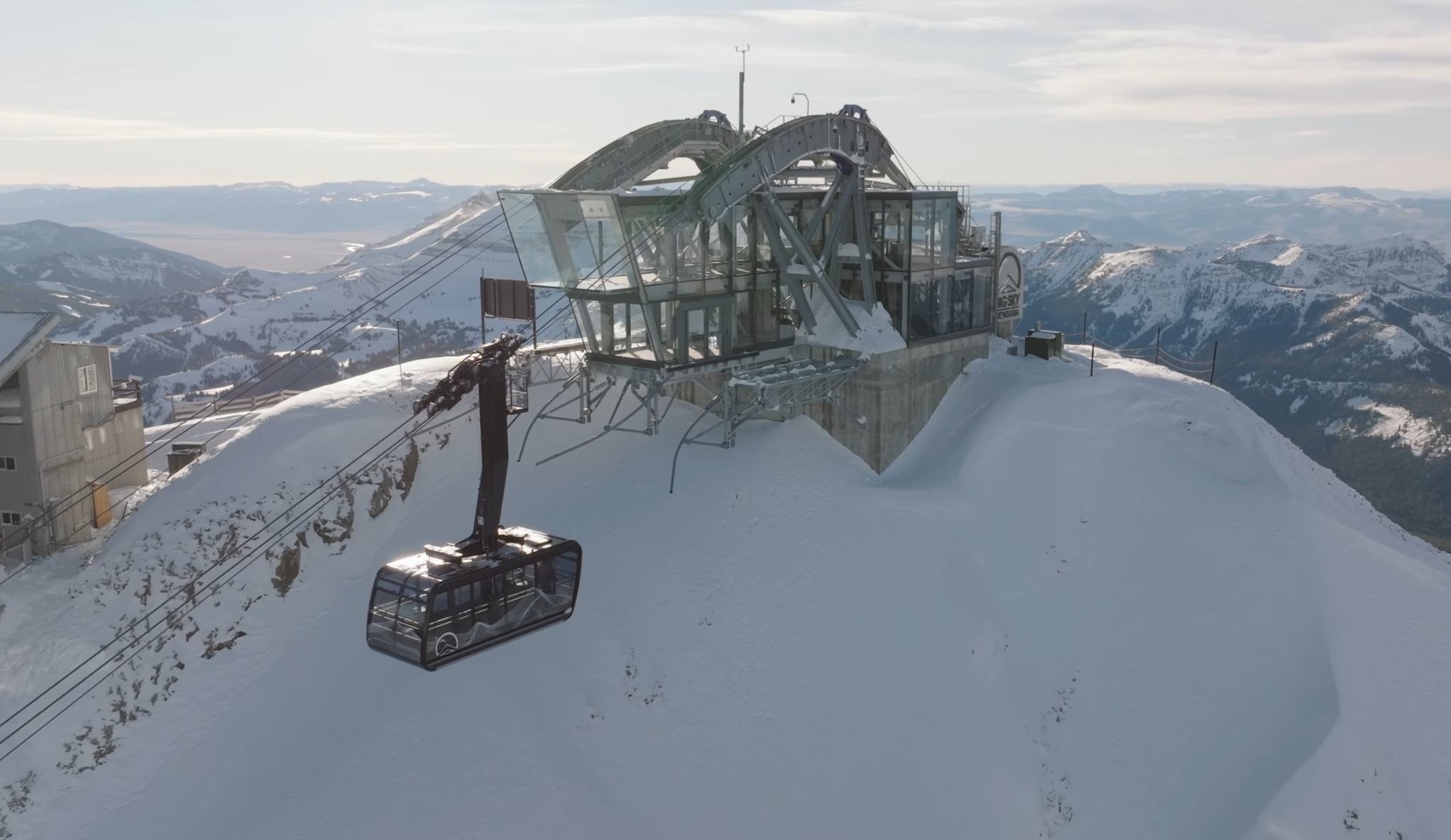 Aerial view of Kircliff glass observation deck with Lone Peak Tram arriving at the summit