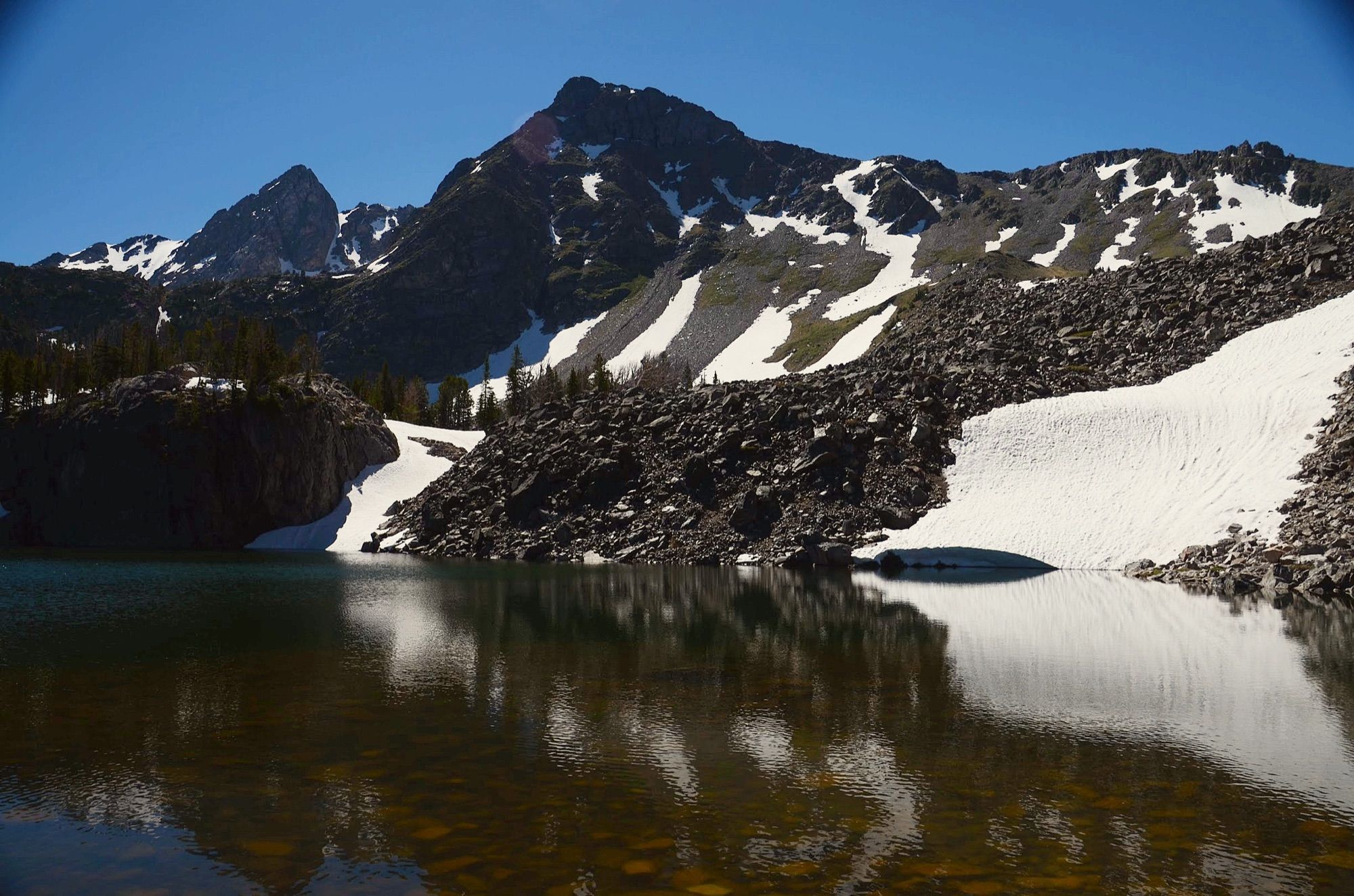 Spanish Lakes reflecting snow-covered peaks and talus in the Spanish Peaks Wilderness