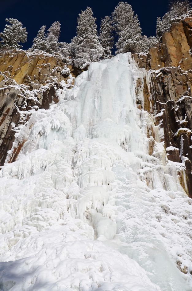 Close-up of frozen Palisade Falls with massive ice formations
