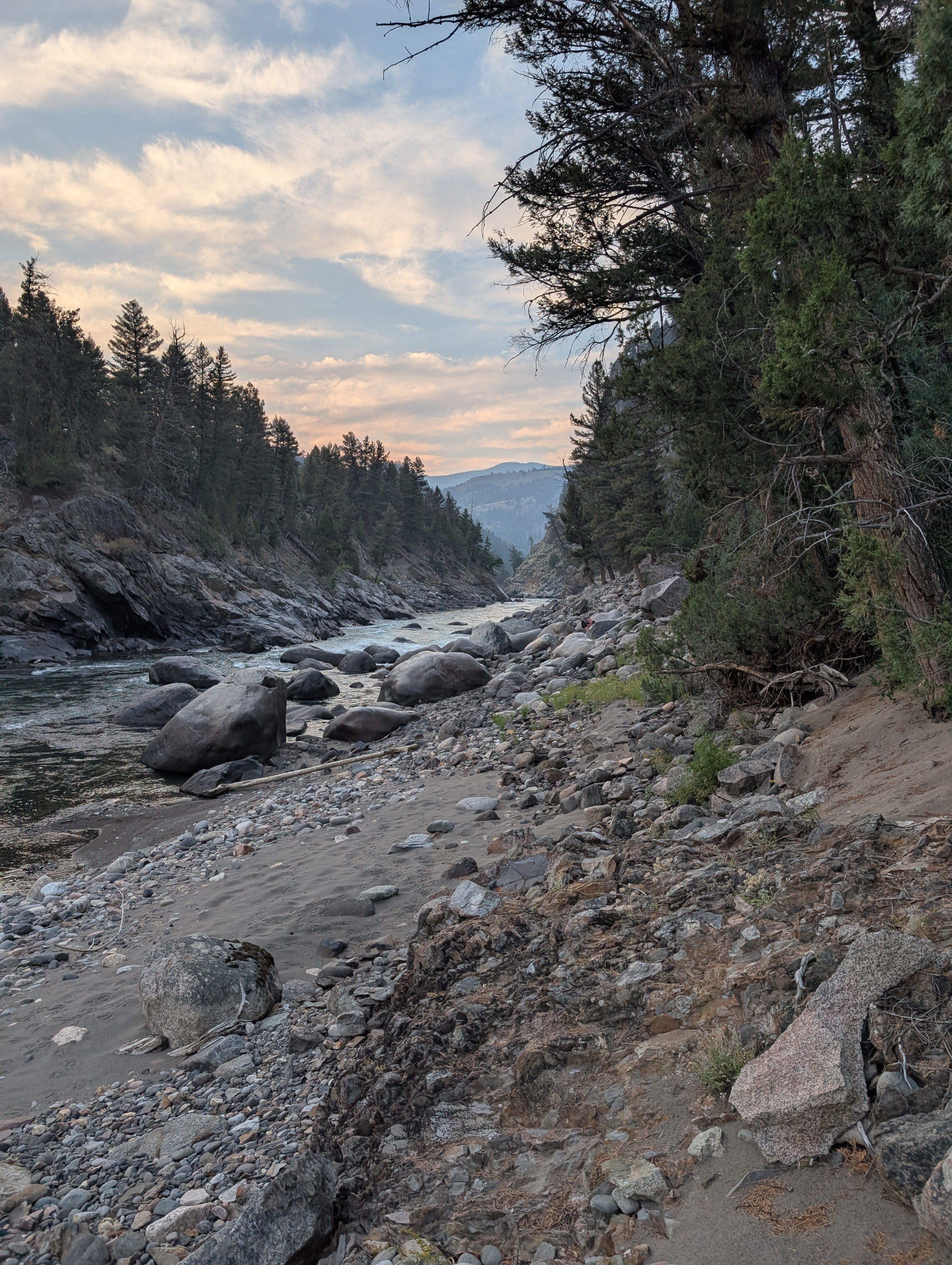 Yellowstone River winding through the rocky canyon below campsite 2H1 at dusk