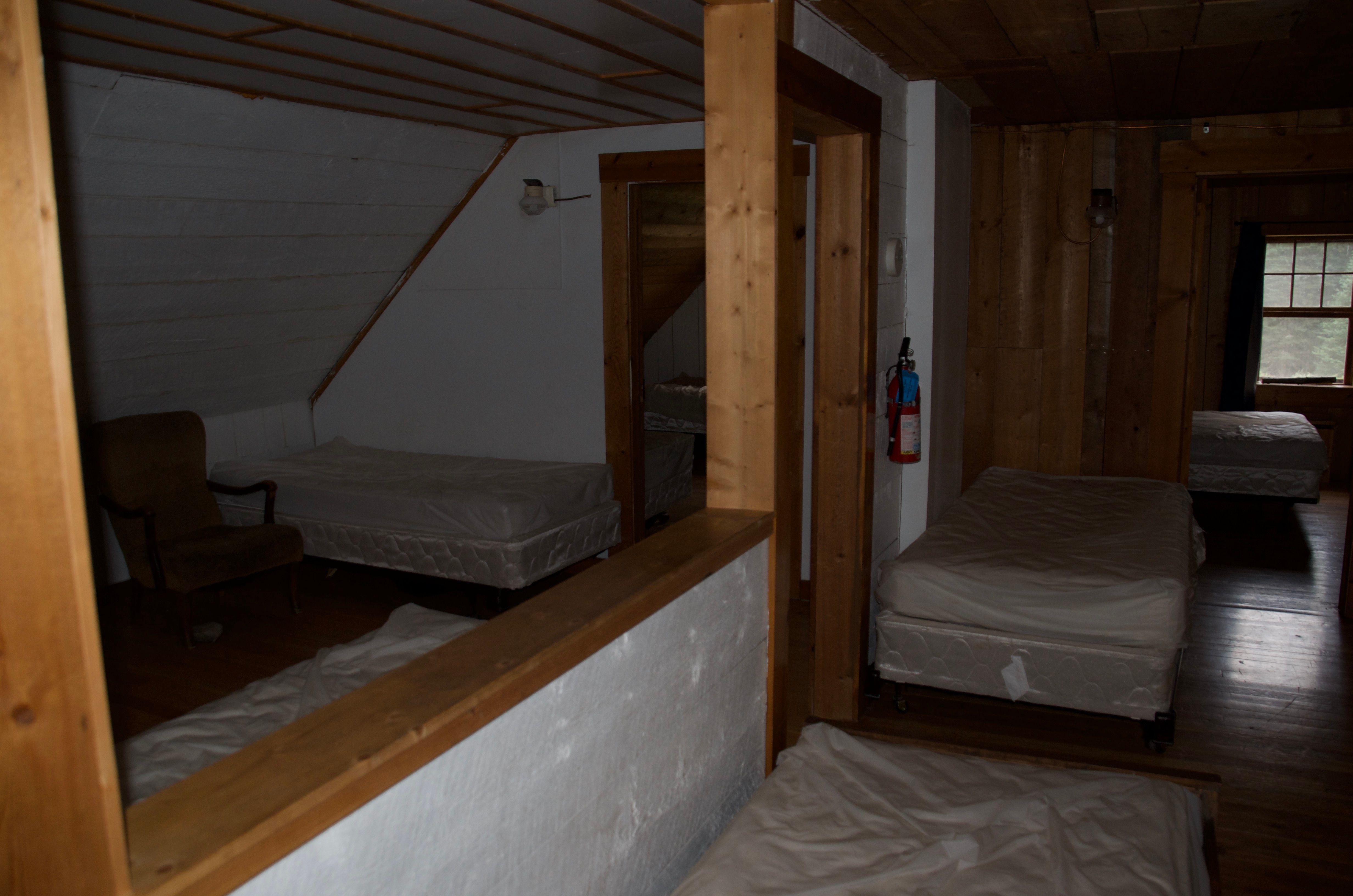 The upstairs loft at Wurtz Cabin looking toward the two separate sleeping rooms