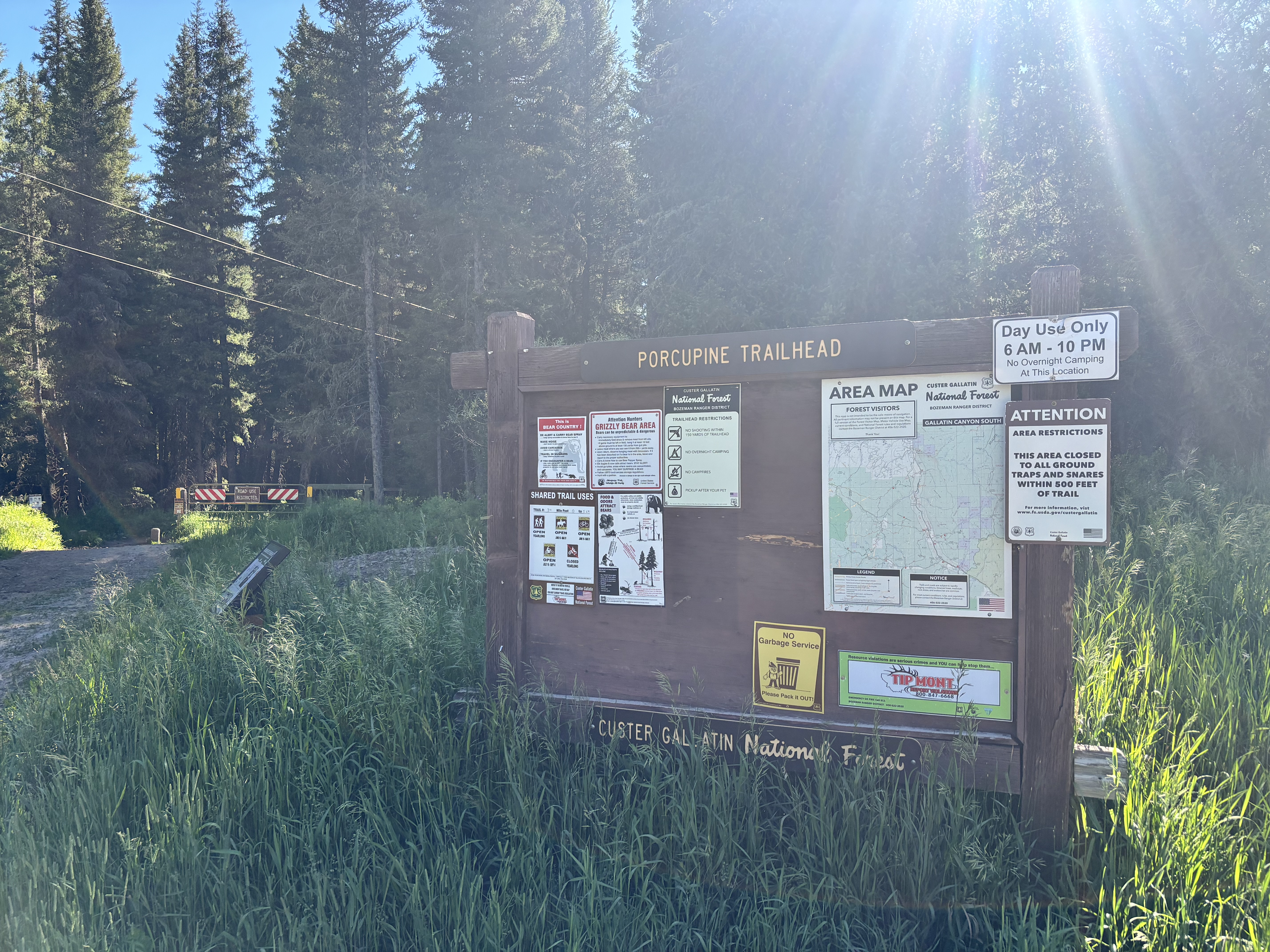 Porcupine Trailhead kiosk with the Custer Gallatin National Forest area map and bear country notices